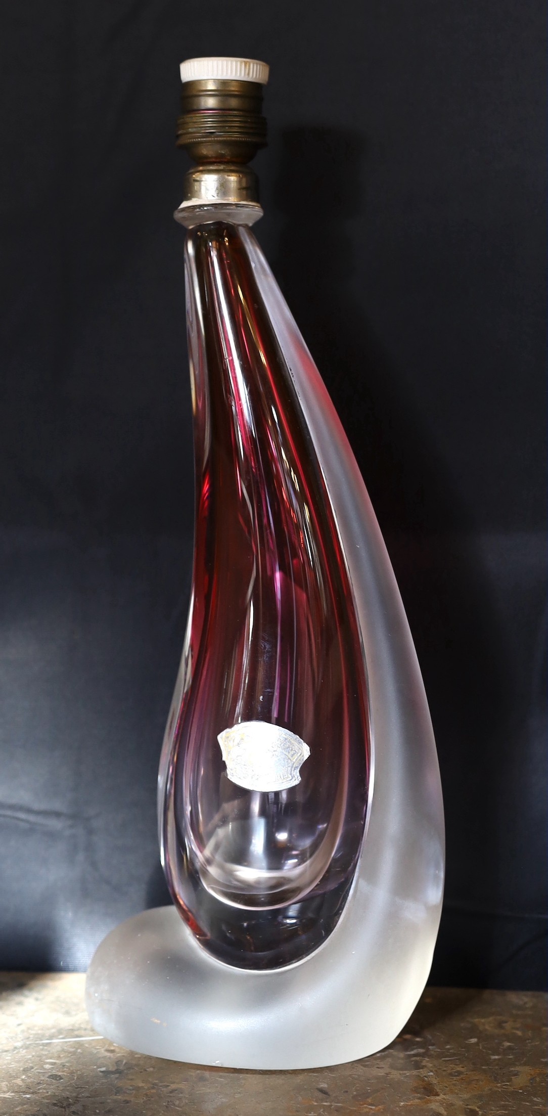 A 1960’s Val St Lambert frosted and cranberry tinted glass table lamp, with original label, height 34cm